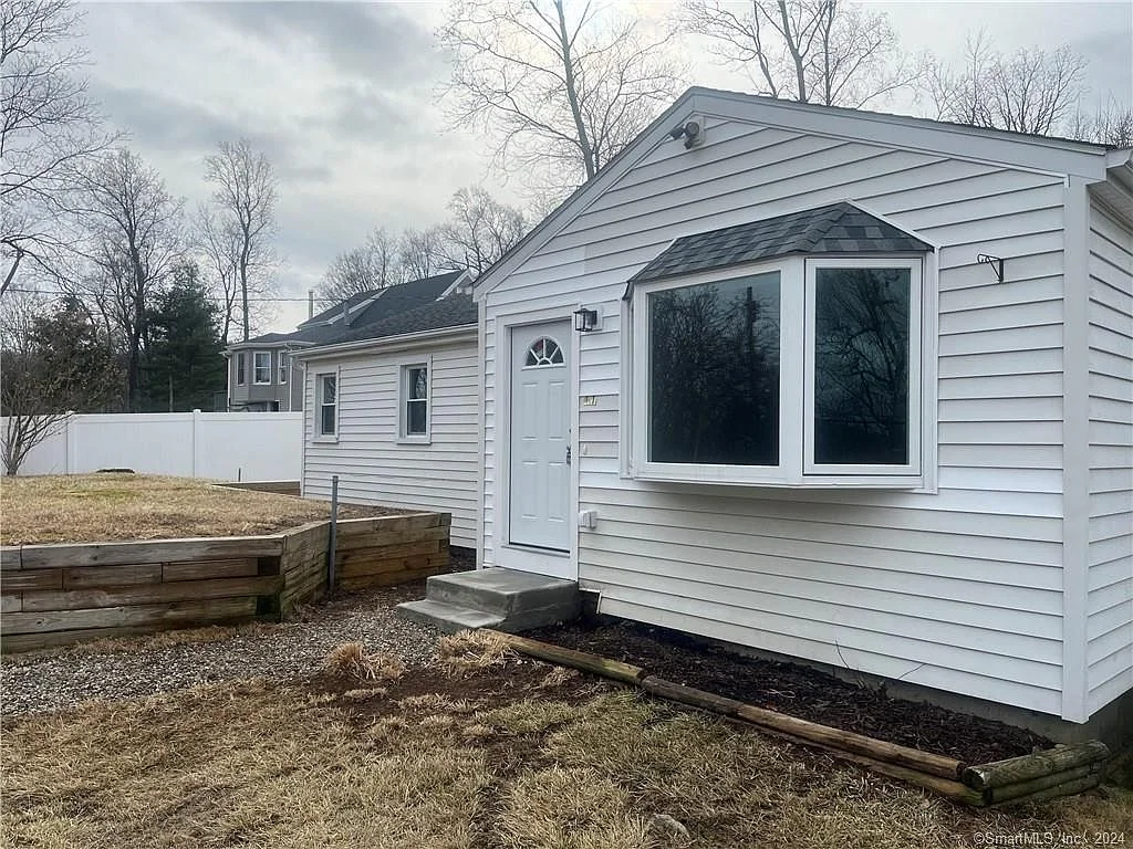 11 Hilldale Road, New Fairfield — white ranch with a bay window